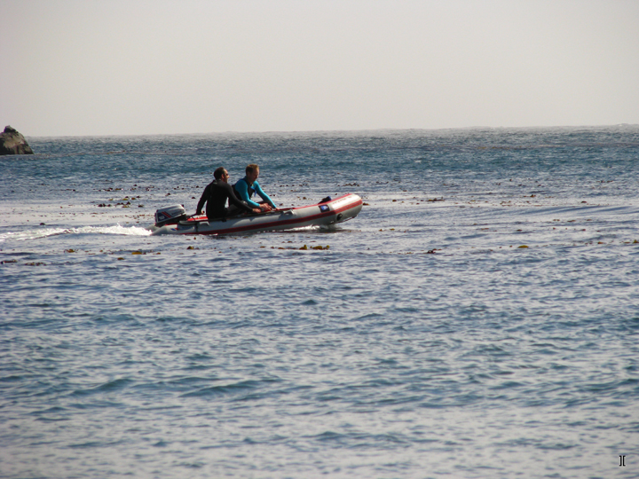 recreational divers in an inflatable boat